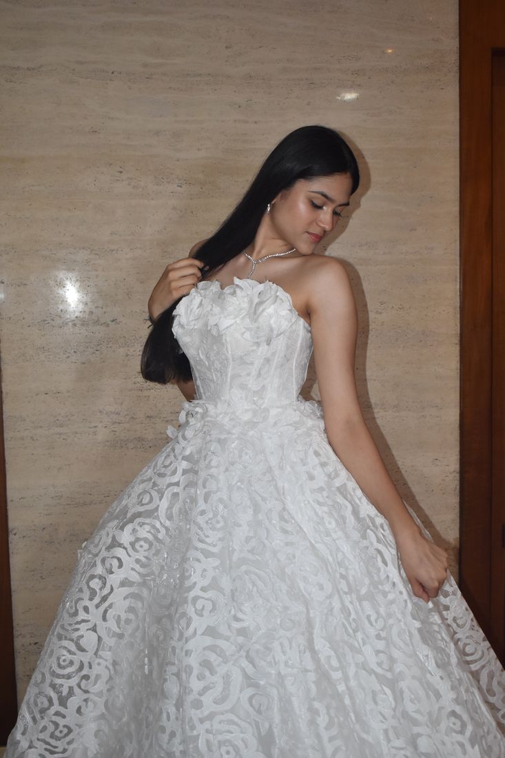 Rosette ball gown with a sweeping skirt